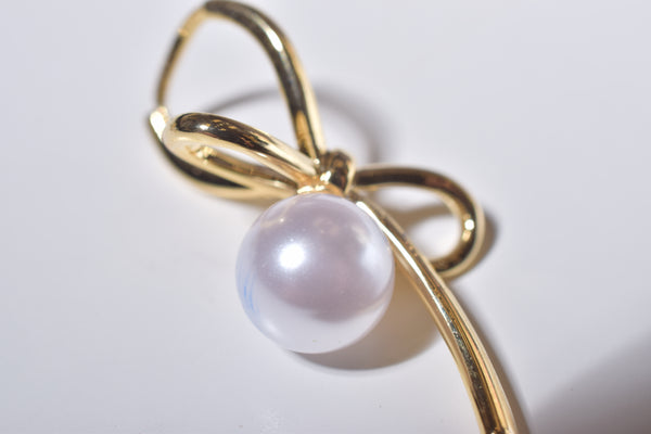 RIBBON PEARL PIERCE