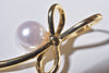 RIBBON PEARL PIERCE