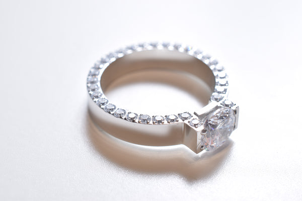 ZIRCONIA SOLITAIRE＆HALF PAVE RING